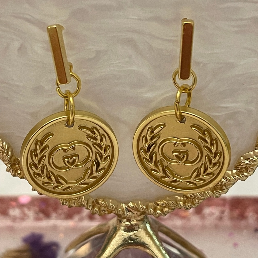 Authentic vintage signed Gucci button earrings